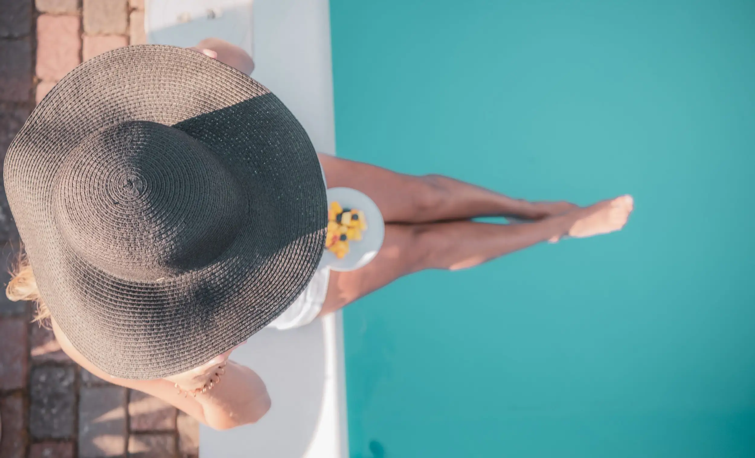 Guide for summer skin, girl by the pool