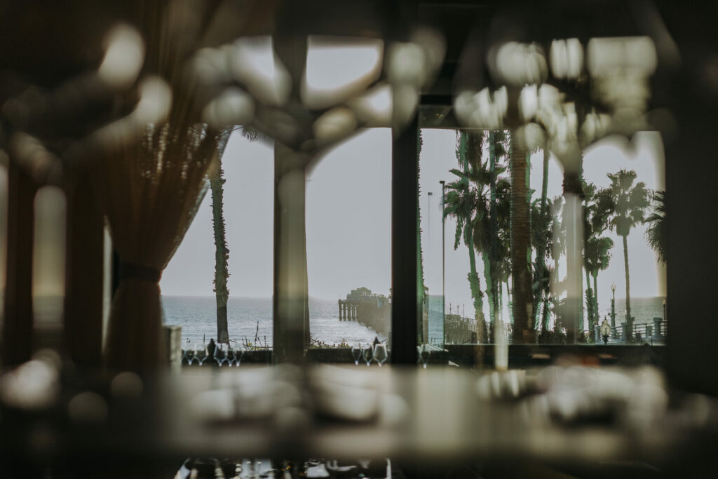 Beach views through the bar's canopy inside mission pacific beach resort