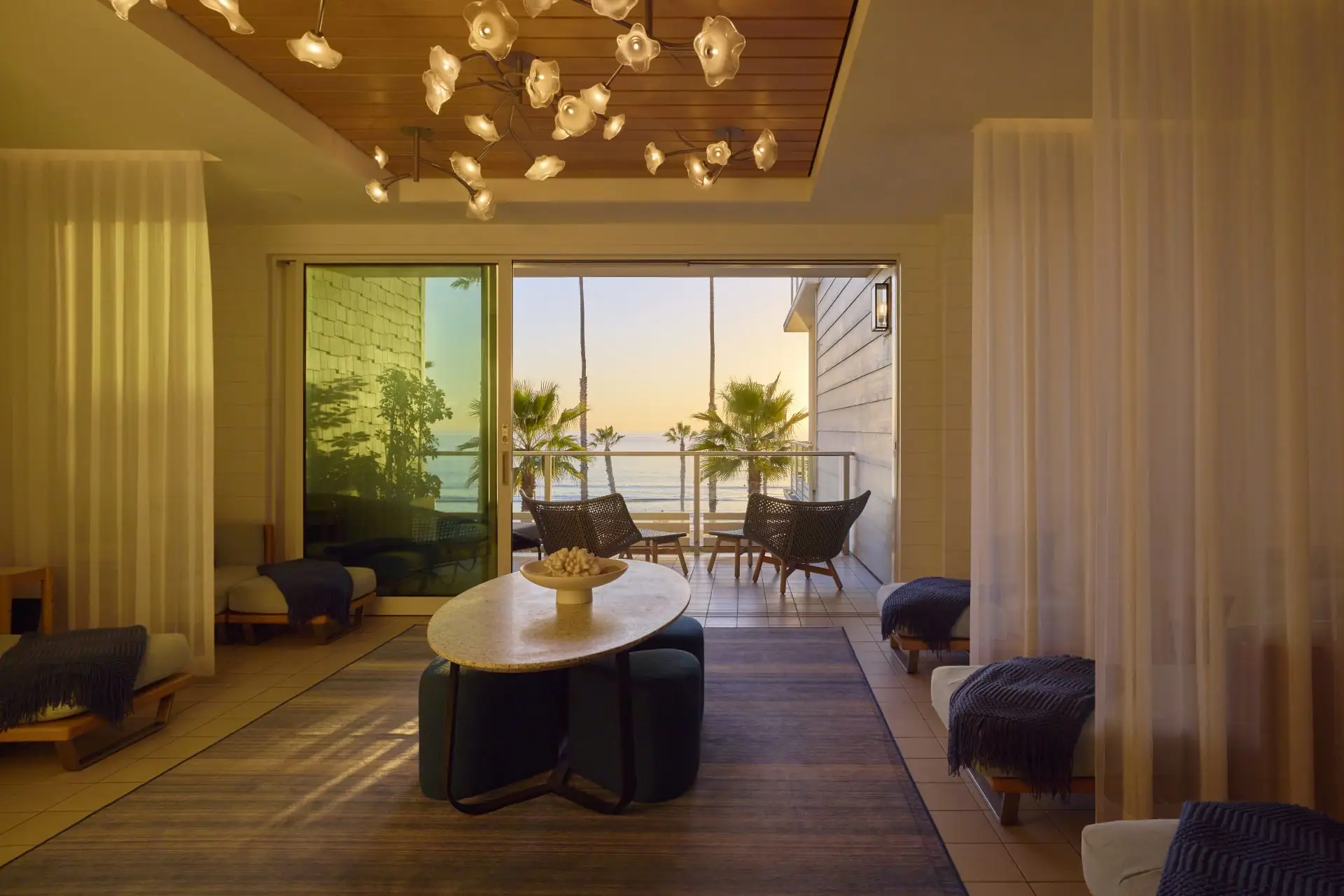 Spa relaxation room with balcony to ocean